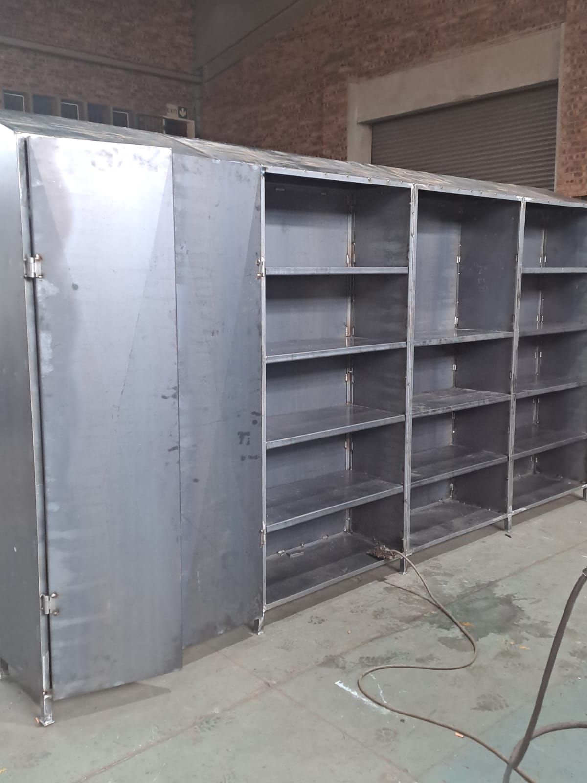 Fabricated steel shelving units