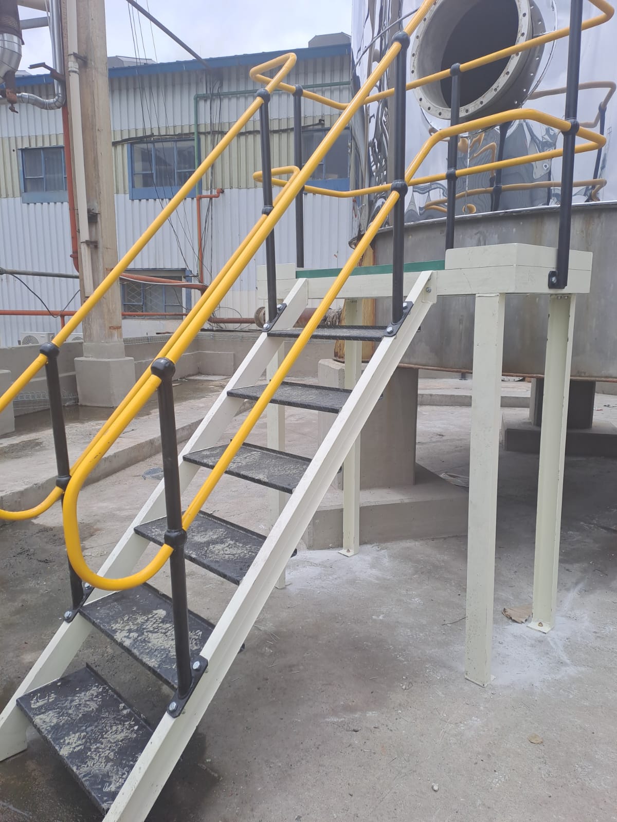Steel access stairs at industrial plant